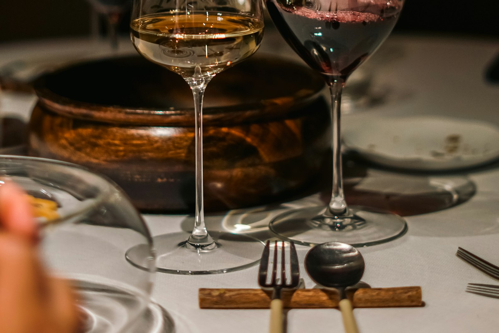 Wine glasses left on a table after a meal