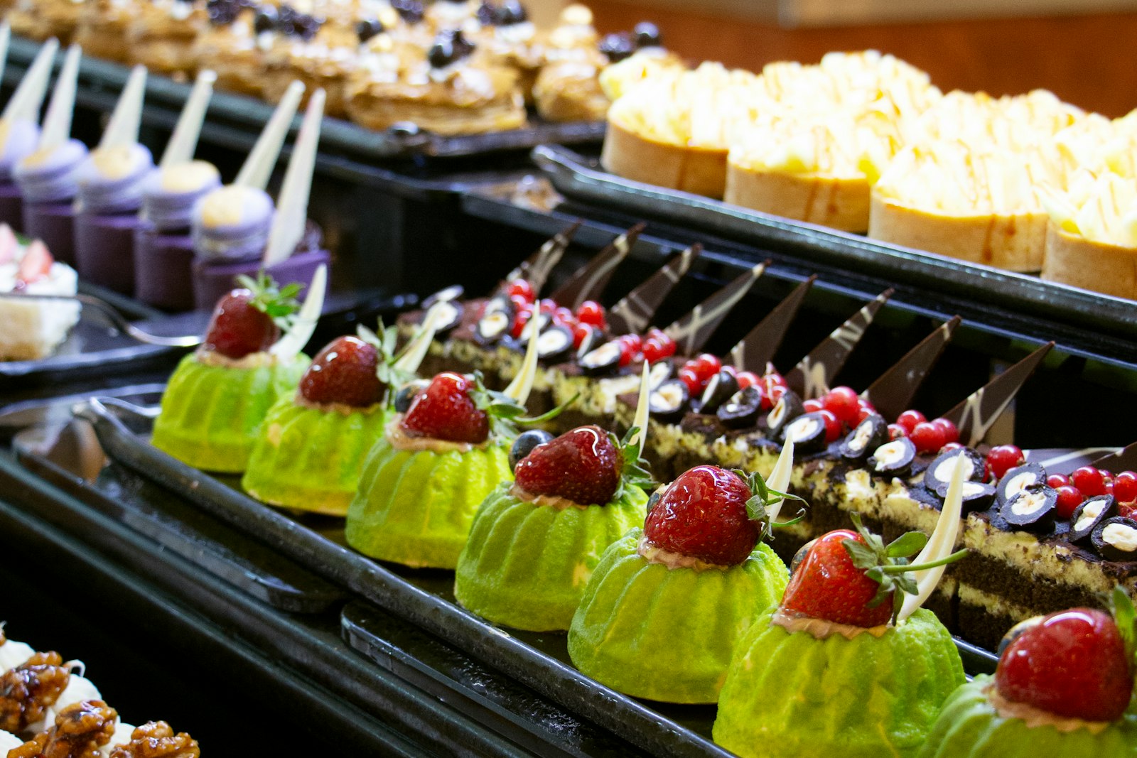 A display counter filled with bright pastries