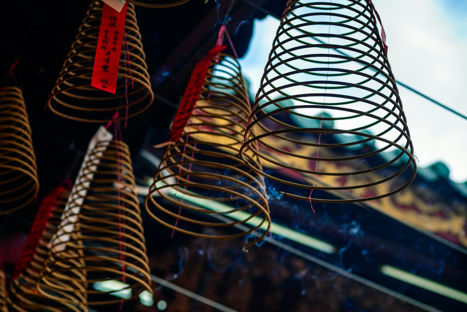 Spiral incense coils burning in a temple